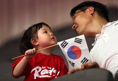 Un padre y su hijo, en los Juegos Asiáticos.