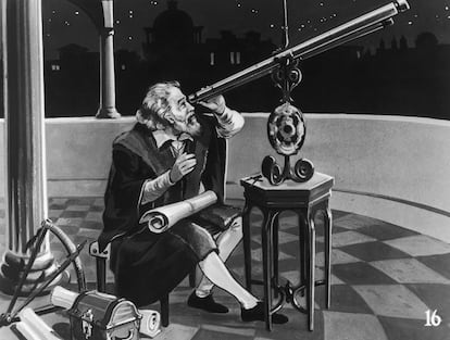 El físico y astrónomo italiano Galileo Galilei (1564-1642) con un telescopio en 1620.