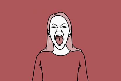 Angry woman screaming with mouth open on red background