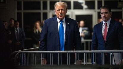 Donald Trump speaks to the media as he leaves the courthouse on April 22 in New York.