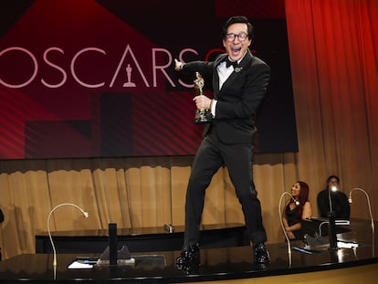 Ke Huy Quan, winner of the Oscar for Best Supporting Actor, poses with his statuette.