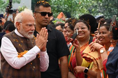 Indian Prime Minister Narendra Modi is welcomed at the Bharatiya Janata Party headquarters in New Delhi, on Sept. 22, 2023.