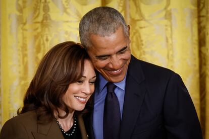 Barack Obama hugs Kamala Harris during an event to mark the 2010 passage of the Affordable Care Act in the East Room of the White House on April 5, 2022, in Washington, DC. 