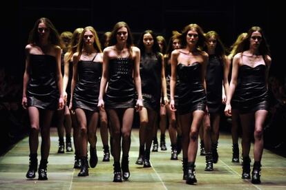 PARIS, FRANCE - MARCH 04: Models walk the runway during Saint Laurent Fall/Winter 2013 Ready-to-Wear show as part of Paris Fashion Week on March 4, 2013 in Paris, France. (Photo by Pascal Le Segretain/Getty Images)