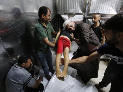 GAZA CITY, GAZA - OCTOBER 09: The body of a girl died in the attacks is brought to the morgue of Al-Shifa Hospital in Gaza City, Gaza on October 09, 2023. (Photo by Ashraf Amra/Anadolu Agency via Getty Images)