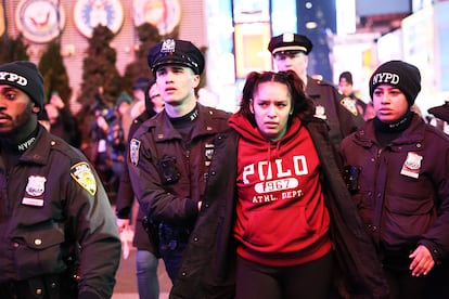 A woman is detained by police during a protest for Tyre Nichols in New York City, on January 27, 2023.