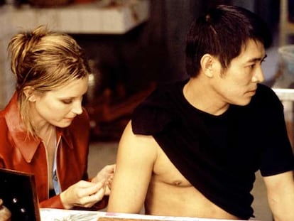 Bridget Fonda y Jet Li, en <i>El beso del dragón</i>, de Chris Nahon.