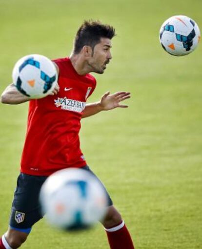 Villa, en un entrenamiento con el Atlético.