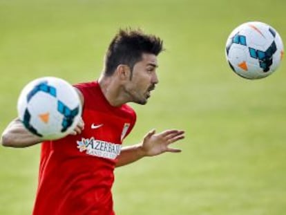 Villa, en un entrenamiento con el Atlético.