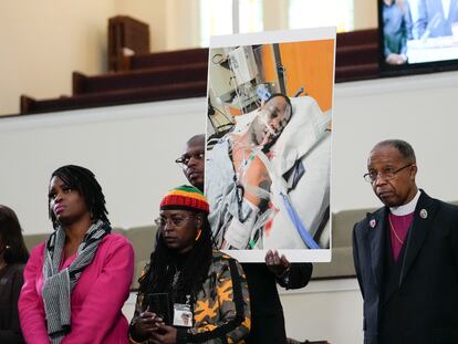 Family members and supporters hold a photograph of Tyre Nichols at a news conference in Memphis, Tenn., Jan. 23, 2023.