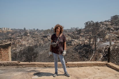 Lucy Castañeda, a resident of El Olivar, standing in what was the patio of her house.