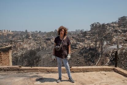 Lucy Castañeda, a resident of El Olivar, standing in what was the patio of her house.