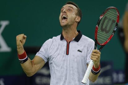 Bautista celebra la victoria ante Djokovic.