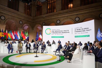 The leaders of Barbados, France, Ethiopia, Brazil, the U.S. and other countries during the summit, on June 23 in Paris.