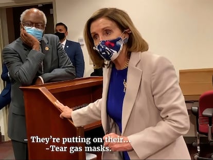 This exhibit from video released by the House Select Committee, shows House Speaker Nancy Pelosi of Calif., with Rep. James Clyburn, D-S.C., in a secure location, displayed at a hearing by the House select committee investigating the Jan. 6 attack on the U.S. Capitol, Thursday, Oct. 13, 2022, on Capitol Hill in Washington. (House Select Committee via AP)