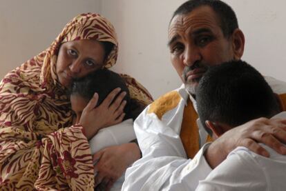 Hawa Mint Cheikh (left) and Mohamed Ould Abdallahi, pictured with their two youngest children.