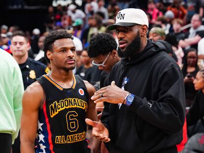 Bronny James #6 of the West team talks to Lebron James of the Los Angeles Lakers after the 2023 McDonald's High School Boys All-American Game at Toyota Center on March 28, 2023 in Houston, Texas.