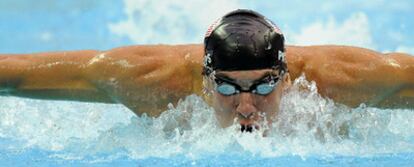 Michael Phelps, ayer en pleno esfuerzo durante las semifinales de los 200 metros mariposa.
