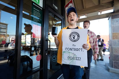 Starbuck workers picket outside of a closed Starbucks on Friday, Dec. 20, 2024, in Burbank, Calif