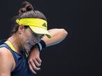Spain's Garbine Muguruza reacts after a point against Japan's Naomi Osaka during their women's singles match on day seven of the Australian Open tennis tournament in Melbourne on February 14, 2021. (Photo by David Gray / AFP) / -- IMAGE RESTRICTED TO EDITORIAL USE - STRICTLY NO COMMERCIAL USE --