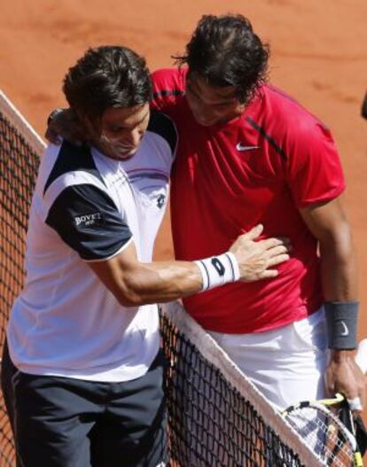 Ferrer felicita a Nadal tras el partido.