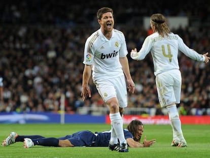 Xabi Alonso se lamenta durante el partido contra el Málaga.