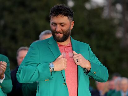 Golf - The Masters - Augusta National Golf Club - Augusta, Georgia, U.S. - April 9, 2023 Spain's Jon Rahm is presented with his green jacket after winning The Masters REUTERS/Brian Snyder