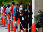 Tennis player Martina Trevisan of Italy gestures as players wait for Covid-19 coronavirus tests at a hotel in Melbourne on February 4, 2021, as six Australian Open warm-up events were on hold and hundreds of players and officials in isolation as a fresh coronavirus case left organisers scrambling to ensure the Grand Slam tennis tournament goes ahead. (Photo by William WEST / AFP) / -- IMAGE RESTRICTED TO EDITORIAL USE - STRICTLY NO COMMERCIAL USE --