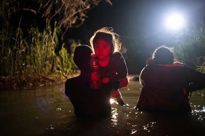 Migrants crossing the Rio Grande into the United States from Mexico on May 13.