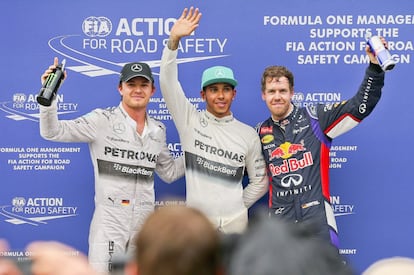 Rosberg, Hamilton y Vettel, tras la clasificación.