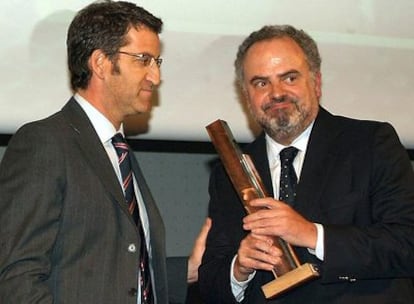 El presidente de la Xunta, Alberto Núñez Feijóo, junto a Ignacio Polanco (derecha).