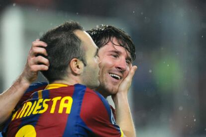 Iniesta y Messi