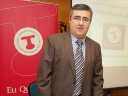 El presidente del Consejo Regulador Ternera Gallega, Jesús González, durante la presentación esta mañana en Santiago de Compostela del informe de actividad de la Indicación Geográfica Protegida en el 2013.