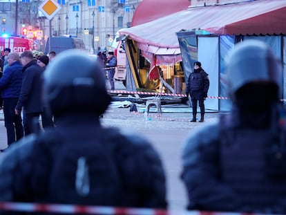 Russian police officers are seen at the site of an explosion at a cafe in St. Petersburg, Russia, on April 2, 2023.