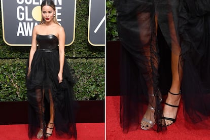 Llevando zapatos de diferente color

La actriz estadounidense de origen coreano Jamie Chung escondía un detalle de color en su estilismo: su sandalia derecha era plateada mientras que la izquierda apostaba por el negro. Merece la pena hacer zoom en los estilismos para toparse con sorpresas como esta. Las sandalias son de Sophia Webster.

 