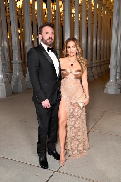 Ben Affleck and Jennifer Lopez, both dressed in Gucci.