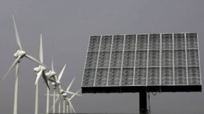 Wind turbines and photovoltaic panels, two regular features of the Spanish landscape.