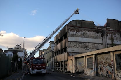 The burned shell of the building following the fire.