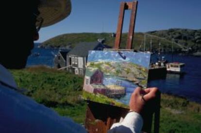 Un pintor en la costa de Monhegan Island, en Maine.