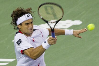 David Ferrer, en el partido ante Michael Llodra en Shanghái.