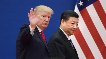 Los presidentes Donald Trump y Xi Jinping en un evento en Pekín