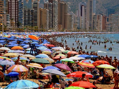 Crowded Beach in Playa Levante, Benidorm, Spain, in High Summer.