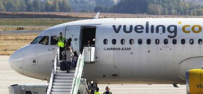 A Vueling jet prepares for departure.