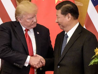 Trump, à esquerda, com o líder chinês, Xi Jinping, em novembro em Pequim.