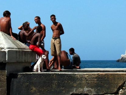 A group of young people at the Malecón in Havana, Cuba.