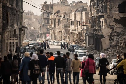 Refugees return to the war-torn city of Aleppo, Syria.