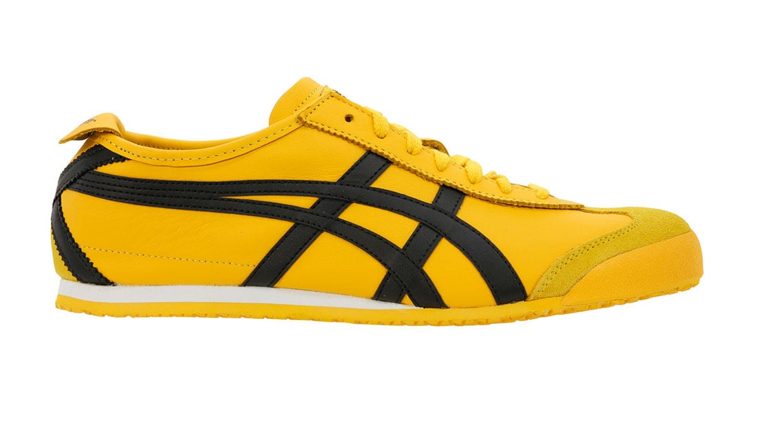 'Tai Chi' de Onitsuka Tiger
Uma Thurman se enfretaba a 'los 88 maniacos' en Kill Bill (Tarantino, 2003) enfundada en el chándal de Bruce Lee y las 'Onitsuka Tiger' amarillas y negras. A día de hoy son un modelo de culto y objeto de deseo para cualquier