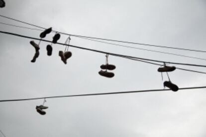 Sneakers hanging from wires in Medellín.