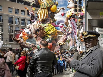 The bustling streets of Valencia during its world-famous Fallas fiestas.