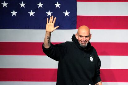 John Fetterman takes the stage at an election night party in Pittsburgh on November 9, 2022.